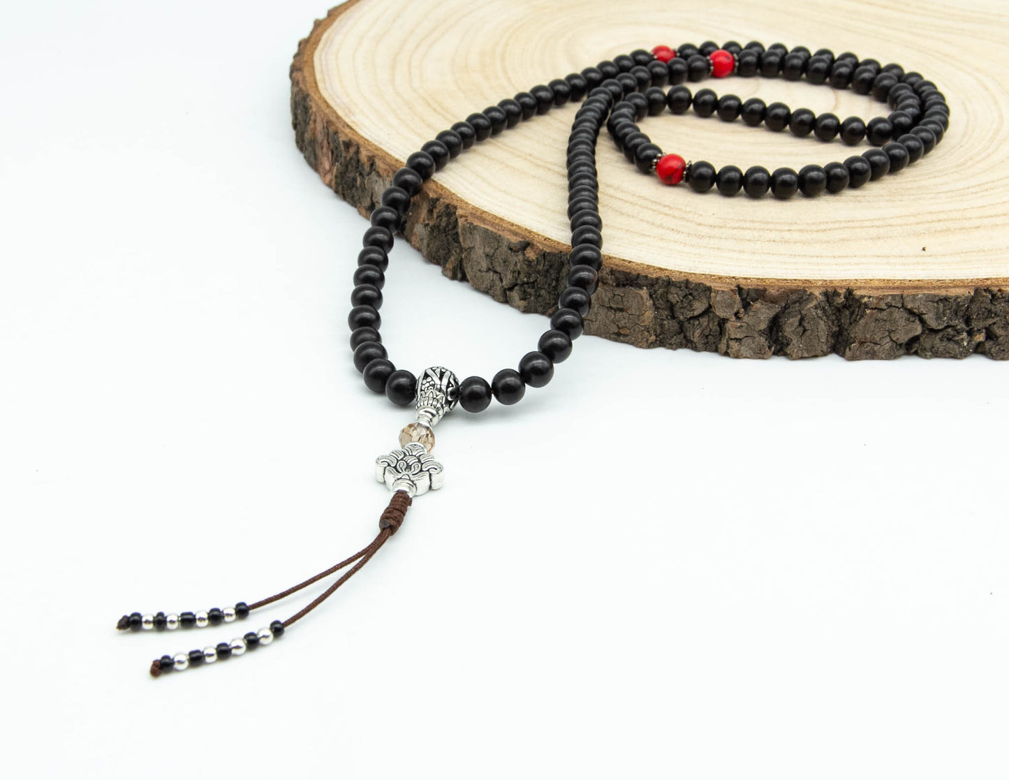 Schwarzes Rosenholz-Mala mit rotem Howlith – 8 mm