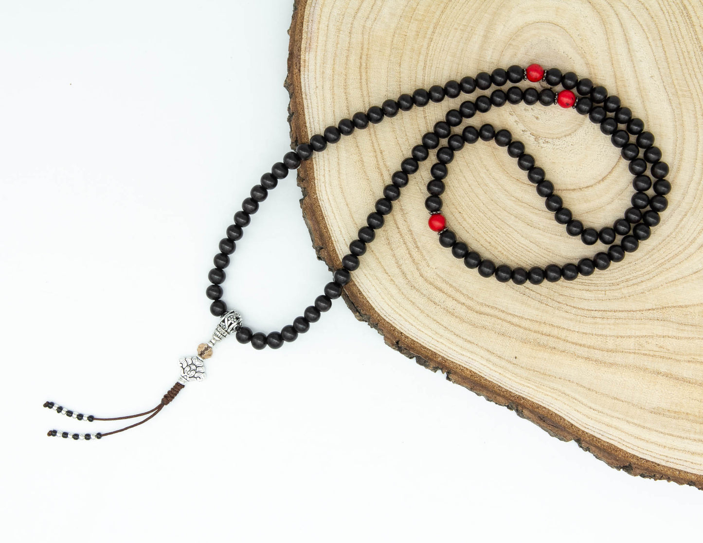Schwarzes Rosenholz-Mala mit rotem Howlith – 8 mm